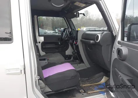 2009 Jeep Wrangler Unlimited Sahara from USA, damaged, VIN 1J4GA591X9L759880